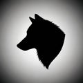 Silhouette of a wolf s head in profile against a gradient grey background Royalty Free Stock Photo