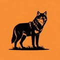 Silhouette of a wolf standing on a patch of grass against an orange Royalty Free Stock Photo