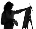 Silhouette of woman artist painting Royalty Free Stock Photo