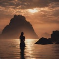 A silhouette of a woman in back view, at a stunning sea, in the water, night scene, mountain, rocks, Royalty Free Stock Photo