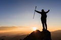 Silhouette woman backpacking travel atop a high rock, sports and active life concept, success