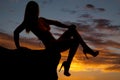 Silhouette woman bikini sit leg crossed Royalty Free Stock Photo