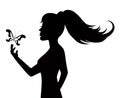 Silhouette of a woman and butterfly Royalty Free Stock Photo