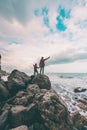 Silhouette of a woman and a child against the sea and sky Royalty Free Stock Photo