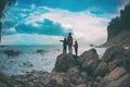 Silhouette of a woman and a children against the sea and sky Royalty Free Stock Photo