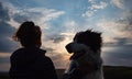 silhouette of woman and dog head at sunset pet teraphy