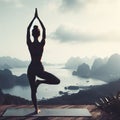 Silhouette of a woman doing yoga in nature at sunset against the backdrop of a pond Royalty Free Stock Photo