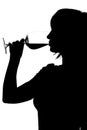 Silhouette of woman drinking red Royalty Free Stock Photo
