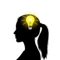Silhouette of woman with glowing light bulb in head representing idea Royalty Free Stock Photo