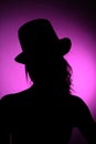 Silhouette of woman head with top hat