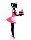 Silhouette of a woman holding a cake with candles