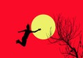 Silhouette woman jumping for cath the sun with beautiful landcape of single tree silhouette background.