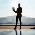 Silhouette, woman and laptop by urban office window for networking, email and development. Website creation, technology Royalty Free Stock Photo