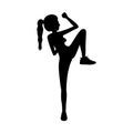 Silhouette woman martial arts low kick