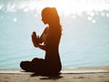 Silhouette of Woman in Meditation on Nature Royalty Free Stock Photo