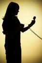 Silhouette of woman on the phone Royalty Free Stock Photo