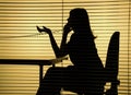 Silhouette of woman on the phone Royalty Free Stock Photo