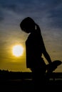 Silhouette of Woman Practicing Yoga Royalty Free Stock Photo