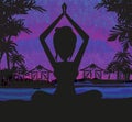 Silhouette woman practicing yoga on the beach Royalty Free Stock Photo