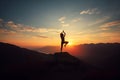Silhouette of woman practicing yoga in the mountains at sunset Royalty Free Stock Photo