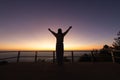 Silhouette of Woman raising his hands in worship, woman praying for god, Christian Religion concept background Royalty Free Stock Photo