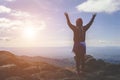 Silhouette woman rising hands on mountain Royalty Free Stock Photo