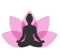 Silhouette of a woman sitting in lotus position on lotus flower background. Girl doing yoga and meditating. Meditation and healthy Royalty Free Stock Photo