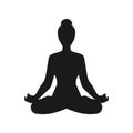 Silhouette of a woman sitting in lotus position. Girl doing yoga and meditating. Meditation and healthy lifestyle Royalty Free Stock Photo