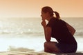 Woman sitting at thought of some things with hope