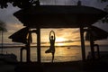 Silhouette of a woman at sunset over Bali sea Royalty Free Stock Photo