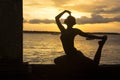 Silhouette of a woman at sunset over Bali sea Royalty Free Stock Photo