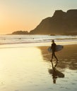 woman surfboard walking beach Portugal Royalty Free Stock Photo