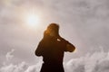 Silhouette of woman taking photo Royalty Free Stock Photo