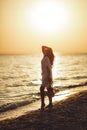 Silhouette of the Woman with Ukulele on the Beach Summer Vacation Royalty Free Stock Photo