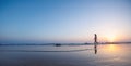 silhouette of a woman walking along the seashore. Spiritual Peace Meditation. A happy girl walks along the seashore against the Royalty Free Stock Photo