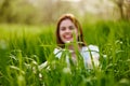 silhouette of a woman walking in tall grass. Photo out of focus Royalty Free Stock Photo