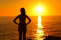 Silhouette of a woman watching sunset Royalty Free Stock Photo
