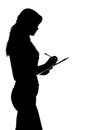 Silhouette of a woman working in an office with a folder for sheets and a pen in the hands Royalty Free Stock Photo