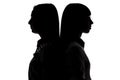 Silhouette of women standing back-to-back