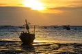 Silhouette wooden fishing boat on beach at sunset, Sriracha Royalty Free Stock Photo