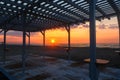 Silhouette of a wooden gazebo at sunset on deserted beach Royalty Free Stock Photo