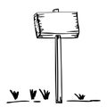 Silhouette wooden placard with stake and grass