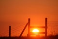 Silhouette of wooden stile at sunset Royalty Free Stock Photo