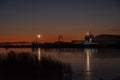 Silhouettes of industrial port on sunset Royalty Free Stock Photo