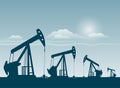 Silhouette of working oil pumps