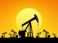 Silhouette of working oil pumps