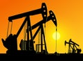 Silhouette of working oil pumps