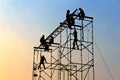 Silhouette of workmen at Twilight