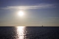 Silhouette of a yacht in the Black sea at dawn, quiet and calm, background Royalty Free Stock Photo