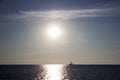 Silhouette of a yacht in the Black sea at dawn, quiet and calm, background Royalty Free Stock Photo